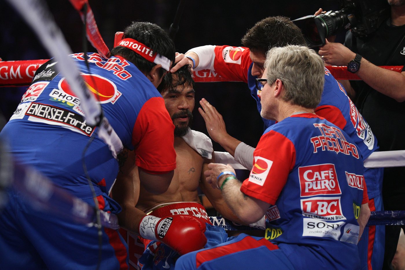 Manny Pacquiao in the corner between rounds with his team.