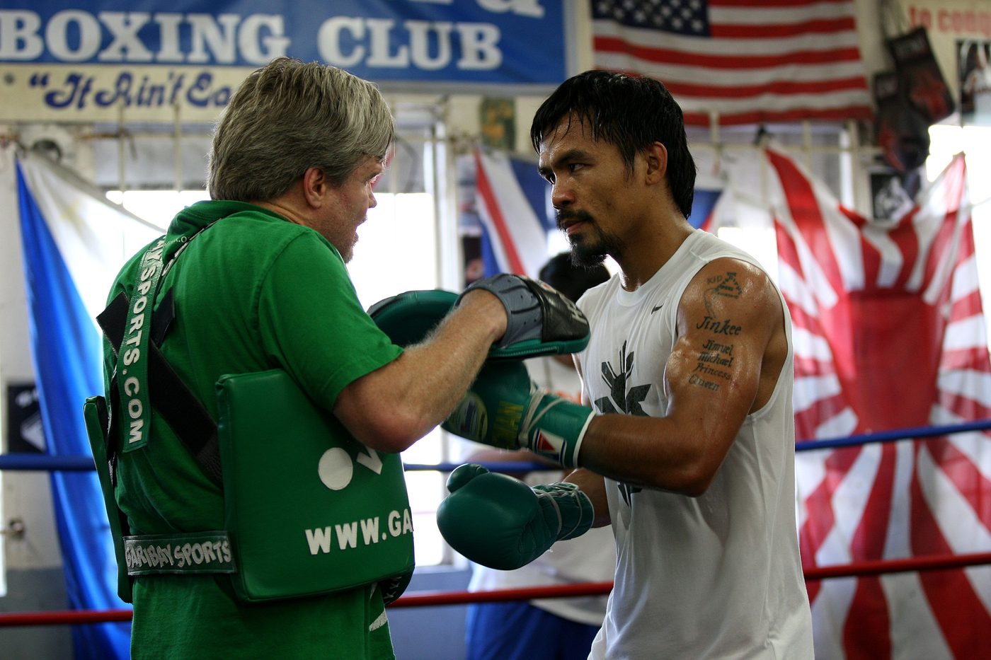 Manny Pacquiao working the mitts with trainer Freddie Roach at the Wild Card Boxing Club.